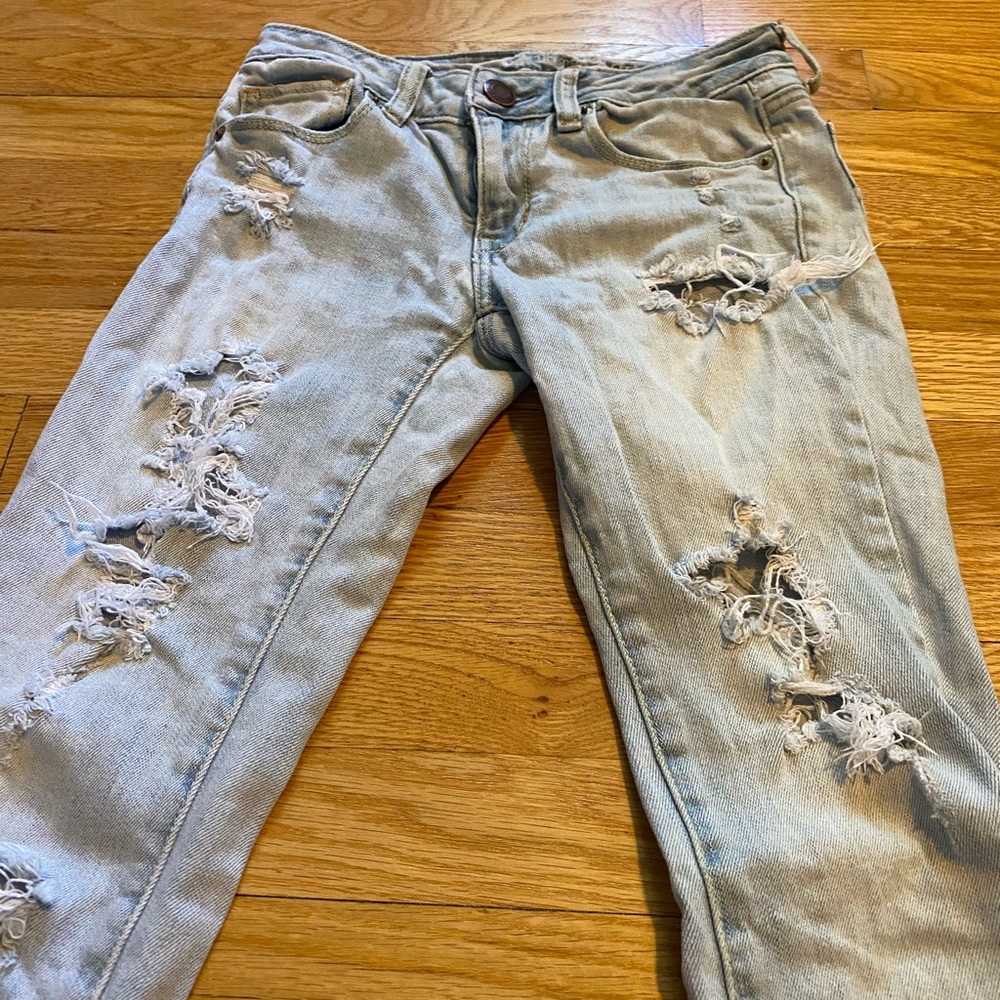 Light Washed Ripped Jeans - Picture 2 of 6